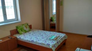 Postel nebo postele na pokoji v ubytování Hotel Uyut