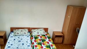 Postel nebo postele na pokoji v ubytování Hotel Uyut