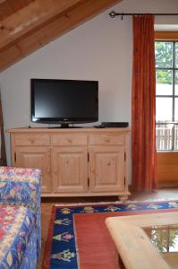 A television and/or entertainment centre at Haus Enzian