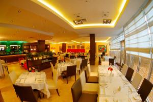 Um restaurante ou outro lugar para comer em Hotel Ciudad de David