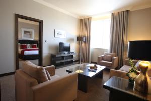 A television and/or entertainment centre at Ramada Downtown Abu Dhabi