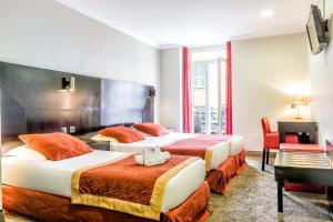 Postel nebo postele na pokoji v ubytování Hotel De Suède + 33 fotografií