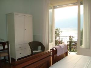 Postel nebo postele na pokoji v ubytování B&B Cherry En Rose