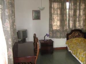 Cama o camas de una habitación en Kitolie Home and Lodge