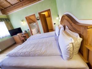 Voodi või voodid majutusasutuse Hotel Bertelli toas