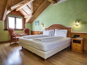 Voodi või voodid majutusasutuse Hotel Bertelli toas