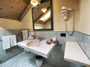 Vannituba majutusasutuses Hotel Bertelli