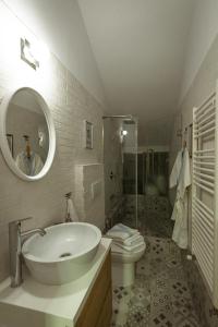 Kylpyhuone majoituspaikassa Vinodorum Apartments