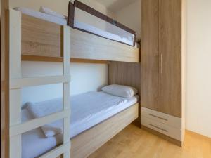 Postel nebo postele na pokoji v ubytování Apartments Livaja