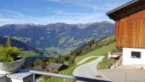 a balcony with a view of a mountain at Glaserhof in Gerlosberg