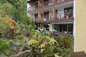 a house with a garden in front of it at Haus Hilgenfeld in Bad Sooden-Allendorf
