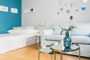 Кровать или кровати в номере Apartament Rozbrat