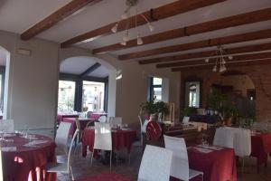 Reštaurácia alebo iné gastronomické zariadenie v ubytovaní La Crota Ristorante e Camere da Danilo dal 1983 + 11 fotografií