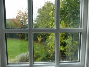 a window with a view of a garden outside at West View Farm in Louth