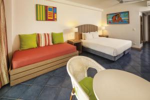 Postel nebo postele na pokoji v ubytování Decameron Isleño - All Inclusive + 37 fotografií