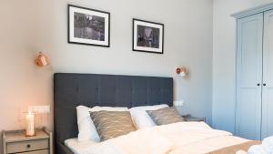 Posteľ alebo postele v izbe v ubytovaní City Center - Riverside by Apartmore