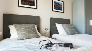 Posteľ alebo postele v izbe v ubytovaní City Center - Riverside by Apartmore