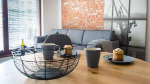 Posedenie v ubytovaní City Center - Riverside by Apartmore