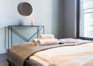 Posteľ alebo postele v izbe v ubytovaní City Center - Riverside by Apartmore