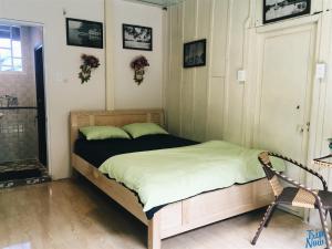 Postel nebo postele na pokoji v ubytování Homestay Hoang Vy