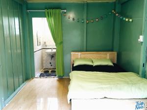 Postel nebo postele na pokoji v ubytování Homestay Hoang Vy