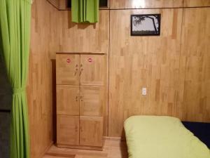 Postel nebo postele na pokoji v ubytování Homestay Hoang Vy