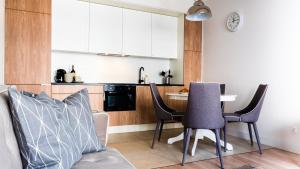 Kuchyňa alebo kuchynka v ubytovaní City Center - Riverside by Apartmore