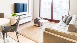 Posedenie v ubytovaní City Center - Riverside by Apartmore