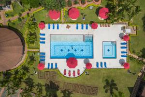 an overhead view of a swimming pool with a resort at Decameron Las Heliconias - All Inclusive in Quimbaya