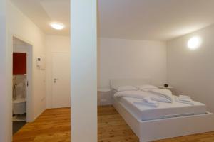 Posteľ alebo postele v izbe v ubytovaní Quercus Appartements contactless check-in
