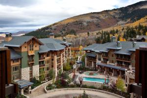 a scenic view of a town with houses and trees at Hyatt Centric Park City in Park City