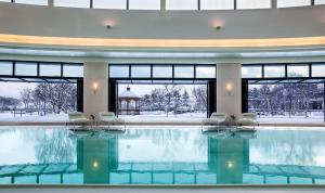 a large swimming pool in a building with snow at Grand Hyatt Incheon in Incheon