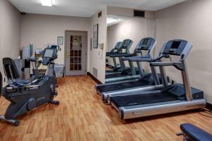 a gym with treadmills and elliptical machines at Hyatt House Dallas Uptown in Dallas