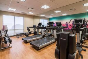 a gym with treadmills and elliptical machines at Hyatt Place Columbus/OSU in Columbus