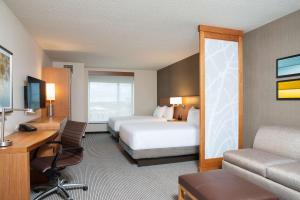 Postel nebo postele na pokoji v ubytování Hyatt Place Champaign/Urbana