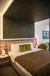 Кровать или кровати в номере Boutique Hotel "Salina"