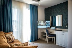 Телевизор и/или развлекательный центр в Boutique Hotel "Salina"