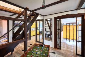 a room with a table with balls on it at Ferienwohnung Schulze in Freital