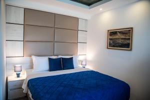 Кровать или кровати в номере Boutique Hotel "Salina"