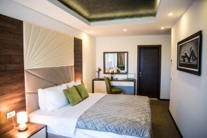 Кровать или кровати в номере Boutique Hotel "Salina"