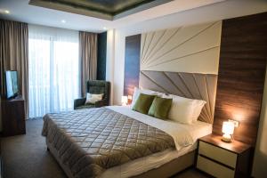 Кровать или кровати в номере Boutique Hotel "Salina"