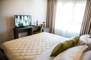 Кровать или кровати в номере Boutique Hotel "Salina"