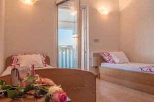 Postel nebo postele na pokoji v ubytování Holiday Home Zdenka