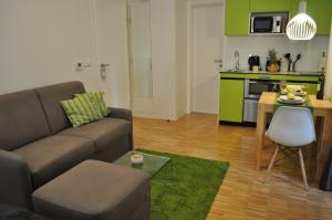 Kuchyň nebo kuchyňský kout v ubytování Studio Apartments City&style