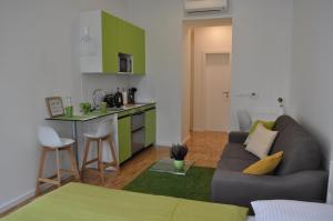 Kuchyň nebo kuchyňský kout v ubytování Studio Apartments City&style