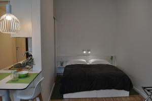 Postel nebo postele na pokoji v ubytování Studio Apartments City&style