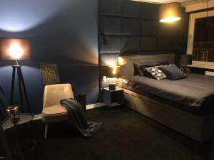 Posteľ alebo postele v izbe v ubytovaní Apartament Mozart