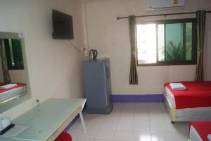 Postel nebo postele na pokoji v ubytování Pineapple Guesthouse