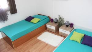Postel nebo postele na pokoji v ubytování Ema Holiday Home