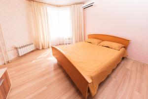Ліжко або ліжка в номері Apartment on Chkalova 51/1